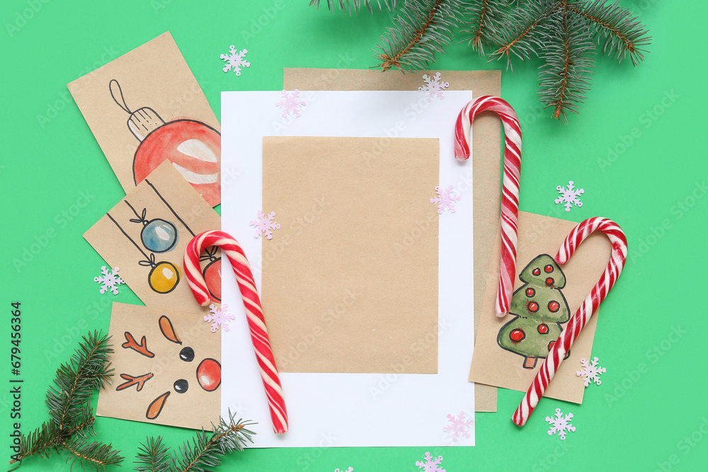 Beautiful composition with Christmas cards on green background