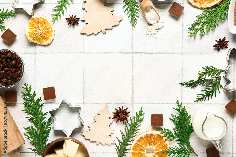 Frame made of different ingredients for preparing Christmas pie on white tile background