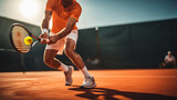 male tennis player aiming to hit tennis ball in hardcourt tennis competition