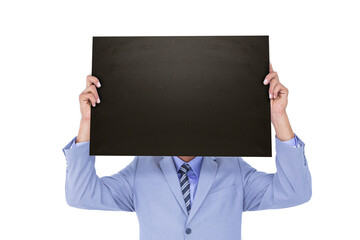 Sticker - Digital png photo of caucasian man holding black card in front of face on transparent background