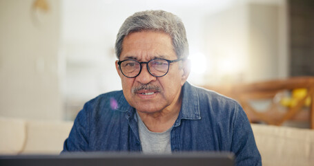 Canvas Print - Laptop, home and senior man online for internet banking, life insurance and mortgage payment. Reading screen, retirement and elderly person on computer for networking, communication and website