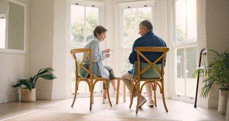 Poster - Home, retirement and coffee with senior couple, conversation and discussion with love, bonding together and speaking. Apartment, sunshine and elderly woman with old man, talking and marriage with tea