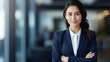 Young confident smiling Asian business woman leader, successful entrepreneur, professional company executive ceo manager, wearing suit standing in office with arms crossed. Made with generativ ai