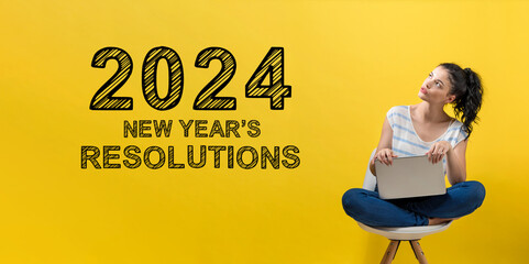 Aufkleber - 2024 New Years Resolutions with young woman using a laptop computer