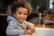 Multiethnic boy playing with water from a sink in a bathroom