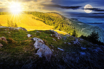 Wall Mural - mountainous landscape with coniferous forest and meadow in autumn with sun and moon at twilight. day