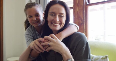 Wall Mural - Love, hug and face of mother with girl child on sofa happy, bond and care in their home together. Family, smile and portrait of mom with kid in a living room for support, security or weekend freedom