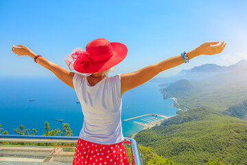 Canvas Print - girl at Antalya panorama. Antalya is famous for its stunning beaches and pristine coastline. Turkey Coast lives up to its name with crystal-clear waters, invite swimming, snorkeling and relaxation.