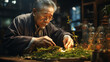 Elderly chinese man preparing herbal remedies.