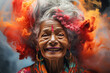 Old lady celebrating holi festival with colorful powder around