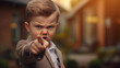 Young businessman who is angry and pointing a finger.​