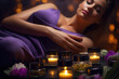 © pilipphoto - Young woman relaxing and enjoying in spa with candles, massage and aromatherapy