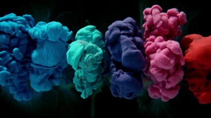 Sticker - Super Slow Motion of Colored Paints Mixing in Water. Isolated on Black Background. Filmed on High Speed Cinema Camera, 1000fps.