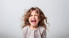 A Girl Screaming On Light Background