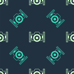 Poster - Green and beige Photo camera for diver icon isolated seamless pattern on blue background. Foto camera icon. Diving underwater equipment. Vector