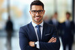 © Synthetica - Happy businessman smiling at camera in office.