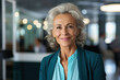 © Synthetica - Senior businesswoman smiling at the camera.
