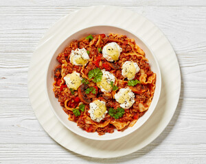 Wall Mural - Lasagnette with ground beef in bowl, top view