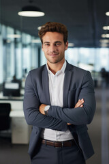 Portrait of young businessman in office.