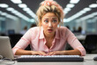 young woman in front of a white keyboard, making a humorous and exaggerated expression of impatience or exasperation. Deadline Dismay: Overwhelmed at the Office