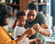 © Lumos sp - child family kitchen food boy son mother father meal fun preparing healthy diet eating home black african american man happy ingredient having fun game joy bonding kid cute