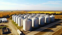 Agricultural Silos On The Farm In Autumn, Close-up Drone View. Industrial Granary, Elevator Dryer, Building Exterior, Storage And Drying Of Grain, Wheat, Corn, Soy, Sunflower. Europe In Hungary