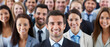 © Synthetica - Group of happy smiling businesspeople standing in a row at office.