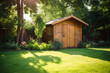 Wooden shed in the garden, with grass lawn
