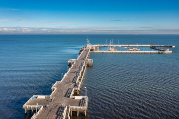 Wall Mural - Aerial view of the Baltic sea coastline and wooden pier in Sopot at autumn, Poland