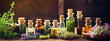 bottles with tinctures of wild medicinal flowers and herbs.Generative AI