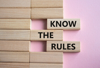 Canvas Print - Know the rules symbol. Wooden blocks with words Know the rules. Beautiful pink background. Business and Know the rules concept. Copy space.