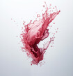 Splash with drops in red wine or juice copy the place for the text on a white background or isolated