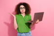 Photo of sad worried girl fro curls dressed stylish clothes modern technology 404 alert oops isolated on pink color background