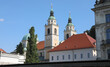 bell towers with a dome with copper roofing of Church St. Nicholas of the city of Ljubljana the capital of Slovenia in central Europe