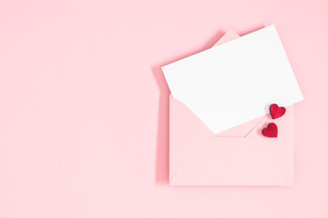Wall Mural - creative minimal valentines day concept. envelope, valentines, hearts confetti on pastel pink backgr