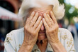 The Struggle to Remember: An Emotional Portrait of an Elderly Woman Battling Alzheimer's
