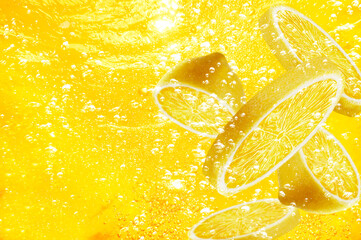 Wall Mural - lemon orange slice drop on water soda