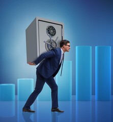 Wall Mural - BUsinessman stealing metal safe from bank