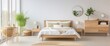 Bedroom in light colors with wooden eco furniture and accessories with a mirror and a panoramic window. The concept of a laconic Scandinavian interior. Copyspace