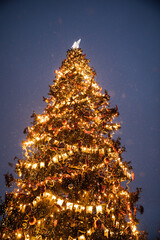 Wall Mural - Christmas tree decorated with toys and lights garland for new year