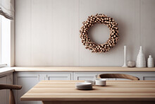 Modern Kitchen Interior In Earthy Beige Colours With Christmas Wooden Beads Wreath Decoration Hanging On Light Wall. Scandinavian Nordic Concept