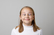 © millaf - Funny kid face. Adorable girl grimacing, portrait