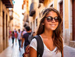 © ismael - Beautiful young woman with long brown hair and sunglasses in the old town of Toledo, Spain. IA generativa