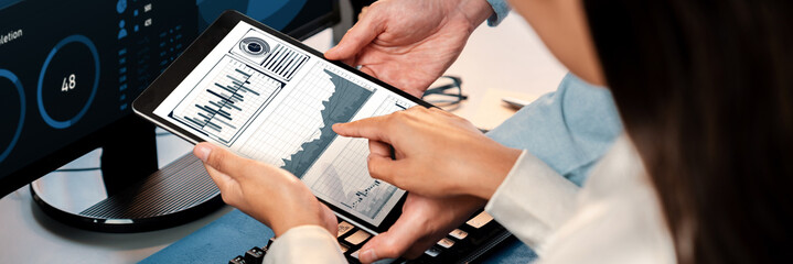 Poster - analyst working on data analysis or bi dashboard on computer monitor. business team analyzing financ