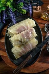 Sticker - Cabbage rolls stuffed with meat and grits .