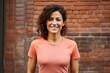 © CogniLens - Portrait of a cheerful woman in her 30s wearing a moisture-wicking running shirt against a vintage brick wall. AI Generation