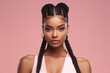 © Surachetsh - The portrait of an attractive young black female model in pink outfit  with braids hairstyle and full makeup isolated on a pink background, shot in a studio. Generative AI.