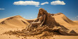 Sand statue of woman disintegrating in desert wind.