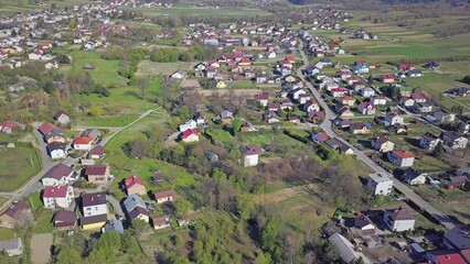 Wall Mural - Kolaczyce, Poland - 9 9 2018: Photograph of the old part of a small town from a bird's flight. Aerial photography by drone or quadrocopter. Advertise tourist places in Europe. Planning a 