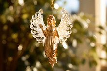 Gold And Crystal Angel Christmas Ornament Bauble Decoration Close Up Hanging In Tree